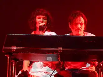 Olivia Merilahti (left) and Dan Levy (right) in 2015