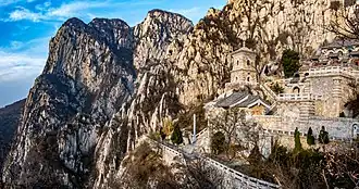 A temple on the slopes of a mountain