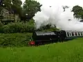 Hunslet Austerity 0-6-0ST no.72 passes the site of the original halt.