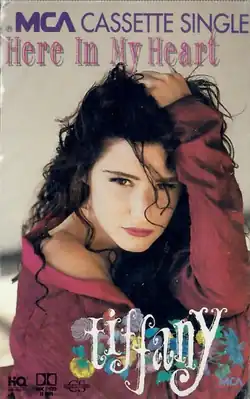 Cassette single of Tiffany's 1990 single, "Here in My Heart".