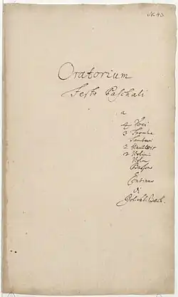 title page of the 1738 autograph, the title and occasion in Latin centered, the performing instruments in a column in the right half