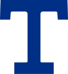 The Toronto Arenas logo, which is a capitalized letter T in blue.