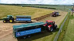 Trailer buses (pulled by farm tractors) in the United Kingdom.