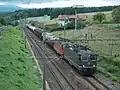 A freight train pulled by two Re 420 units