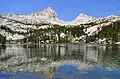 Bear Claw Spire (left) and Spire Peak (right) reflected in Honeymoon Lake