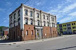 Tremont House, Collingwood, Ontario, circa 2005, abandoned, lower windows boarded and slated for demolition, parapets missing along roofline