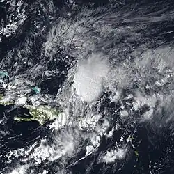 A photograph of an extratropical cyclone, that shortly became a tropical storm, just north of a Puerto Rico