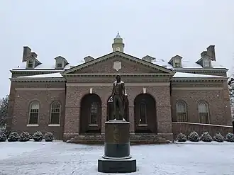 Tucker Hall and Monroe statue in the snow