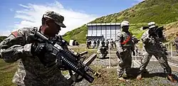 Soldiers of E Company, 100th/442nd train at Marine Corps Base Hawaii in 2011