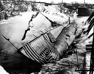 Hawkbill (SS-366), launches sideways into the Manitowoc River on 9 January 1944.