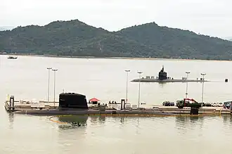 USS Jacksonville passing by KD Tunku Abdul Rahman at Sepanggar on 11 October 2010.
