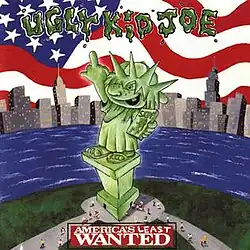 Ugly Kid Joe's mascot as the Statue of Liberty giving the finger and holding a pornographic magazine