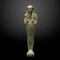 Ushabti; 360–343 BC; ceramic and enamel; 26.7 × 7.1 cm; from Saqqara; Museum of Art and History (Geneva, Switzerland)