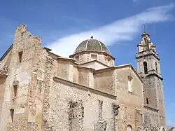 An old building with a dome and a bell tower.
