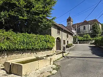 Rue de la Cure and Saint-Léger church