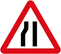 Road narrows on left