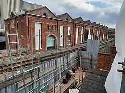 The warehouse fronting the railway, 2023