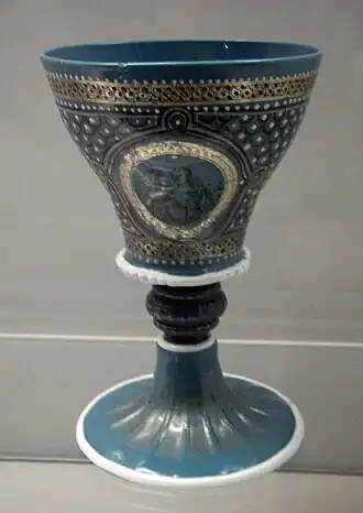 Goblet in opaque turquoise glass with enamel painted over (WB.55)