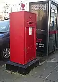 Large square pillar box (type A wall box freestanding) in Gloddaeth Street, Llandudno, Wales