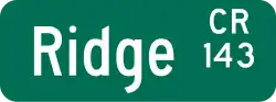 Green rectangle with Ridge, CR, and 143 in white. Ridge is at left while CR and 143 are grouped together at right.
