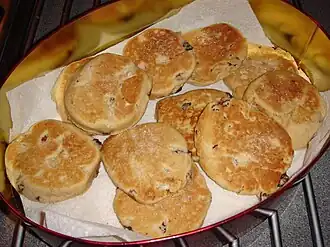 Welsh cakes are cooked on a griddle.