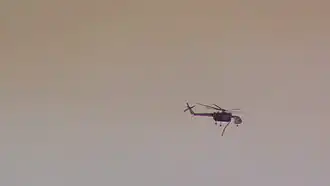 A helicopter leaving the Whittier Fire, July 11, 2017.