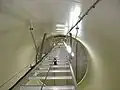Ladder providing access to the nacelle of a wind turbine in Lower Austria. Photo taken following an inspection. The view is from bottom to top, showing the safety rope for the climb