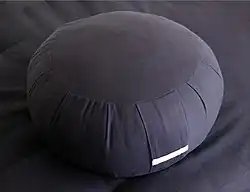 A zafu meditation cushion, often used in Buddhist practice