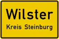 Sign 310 Start of urban area (implied 50 km/h speed limit)
